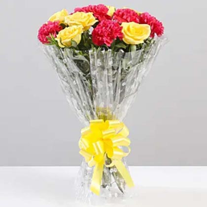 Attractive bouquet of roses and carnations
